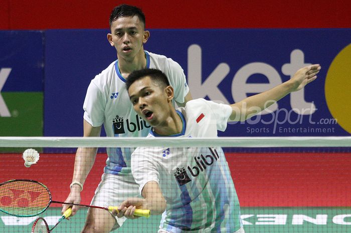 Pebulutangkis ganda putra Indonesia Fajar Alfian/Muhammad Rian Ardianto saat melawan pebulutangkis ganda putra asal China Huang Kai Xiang/Liu Cheng dalam turnamen bulutangkis Indonesia Open 2019 di Senayan, Jakarta, Selasa (17/7/2019) Fajar Alfian, Indonesia Muhammad Rian Ardianto berhasil maju keba