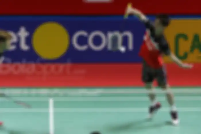 Pebulutangkis ganda putra Indonesia Marcus Fernaldi gideon, Kevin Sanjaya Sukamuljo saat melawan pebulutangkis ganda putra asal India Satwiksairaj Rankireddy, Chirag Shetty dalam turnamen bulutangkis Indonesia Open 2019 di Senayan, Jakarta, Kamis (18/7/2019).