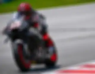 Marc Marquez saat menjalani Tes Sepang di hari pertama.