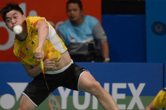 Mantan ganda putra Malaysia,Tan Boon Heong berpasangan dengan Tan Wee Kiong  pada Indonesia Open 2014, 20 Juni 2014.