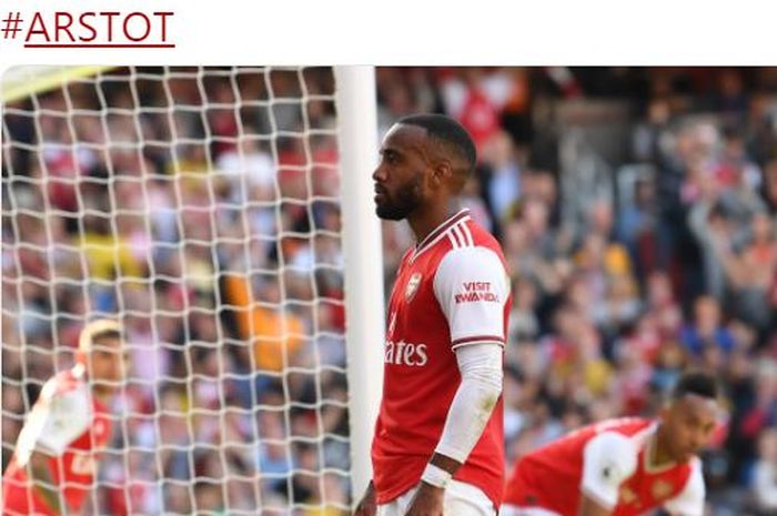 Penyerang Arsenal, Alexandre Lacazette, merayakan gol yang dicetak ke gawang Tottenham Hotspur dalam laga Liga Inggris di Stadion Emirates, Minggu (1/9/2019).