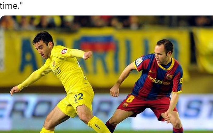 Penyerang Villarreal, Giuseppe Rossi, mendapat penjagaan dari gelandang Barcelona, Andres Iniesta.