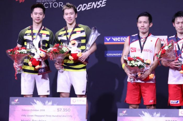 Marcus Fernaldi Gideon/Kevin Sanjaya Sukamuljo ketika menjadi juara ganda putra Denmark Open 2018.