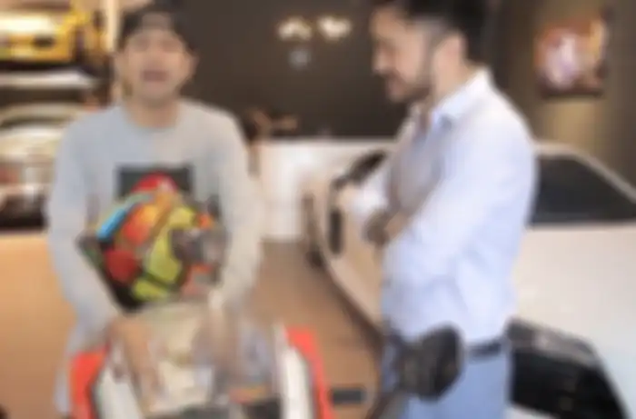 Raffi Ahmad dan Rudy Salim diatas moge Aprilia RSV4 Factory