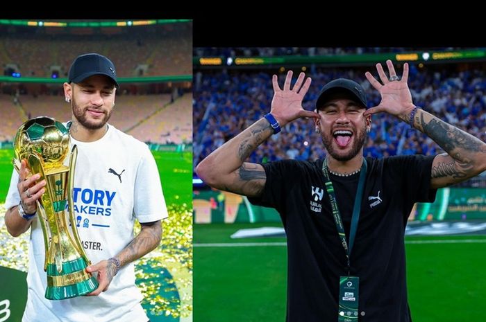 Neymar mengangkat trofi King's Cup seusai Al Hilal menekuk klub Cristiano Ronaldo, Al Nassr, lewat adu penalti di Stadion King Abdullah Sports City, Jeddah, Sabtu (1/6/2024) dini hari WIB. Dia bahkan menampilkan gestur mengejek.