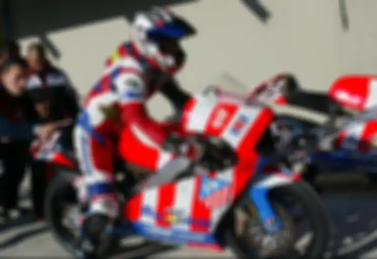 Alvaro Bautista di kelas GP125cc pada tahun 2002 bersama tim Aprilia