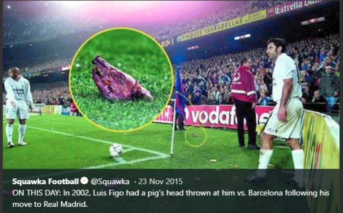 Gelandang Real Madrid, Luis Figo, saat mendapat lemparan kepa babi dari suporter Barcelona di Camp Nou.