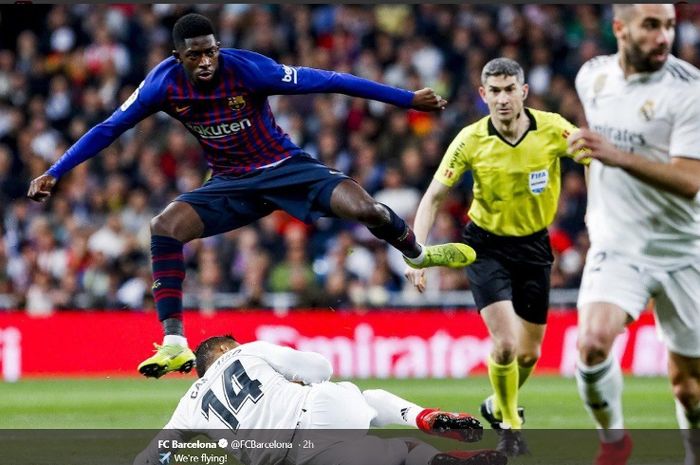 Aksi pemain Barcelona, Ousmane Dembele, dalam duel melawan Real Madrid di Estadio Santiago Bernabeu, Sabtu (2/3/2019)