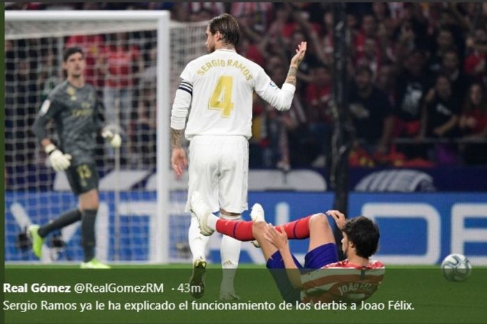 Gesture kapten Real Madrid, Sergio ramos, kepada Joao Felix dalam laga kontra Atletico Madrid di Wanda Metropolitano, Sabtu (28/9/2019).