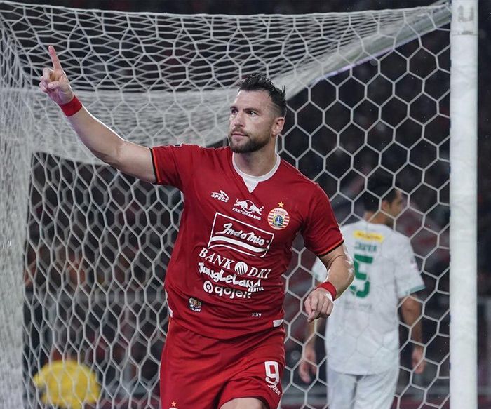 Striker Persija Jakarta, Marko Simic, merayakan golnya ke gawang Persebaya Surabaya dalam laga pekan ke-33 di Stadion Utama Gelora Bung Karno (SUGBK), Jakarta Utara, Selasa (17/12/2019).