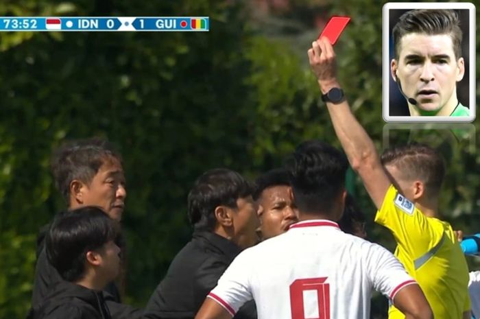 Wasit Francois Letexier menghukum Pelatih Timnas U-23 Indonesia Shin Tae-yong dengan kartu merah dalam play-off Olimpiade Paris 2024 melawan Guinea di Lapangan INF Clairefontaine, Clairefontaine-en-Yvelines, Prancis, Kamis (9/5/2024).