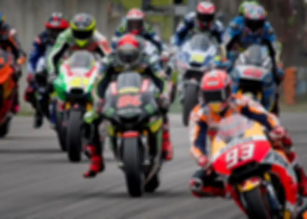 Marc Marquez bertarung ketat dengan Jonas Folger (#94), pembalap Jerman dari tim Yamaha Tech3 di MotoGP Jerman 2017