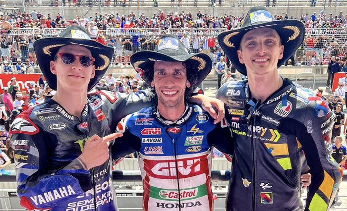 Dari kiri ke kanan,, Fabio Quartararo (Monster Energy Yamaha), Alex Rins (LCR Honda), Luca Marini (Mooney VR46) di podium balapan MotoGP Americas 2023 di Circuit of The Americas, Minggu (16/4/2023).