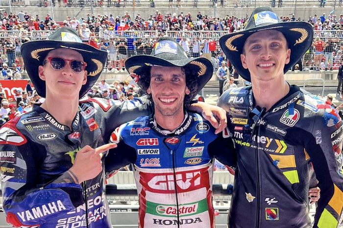 Dari kiri ke kanan,, Fabio Quartararo (Monster Energy Yamaha), Alex Rins (LCR Honda), Luca Marini (Mooney VR46) di podium balapan MotoGP Americas 2023 di Circuit of The Americas, Minggu (16/4/2023).