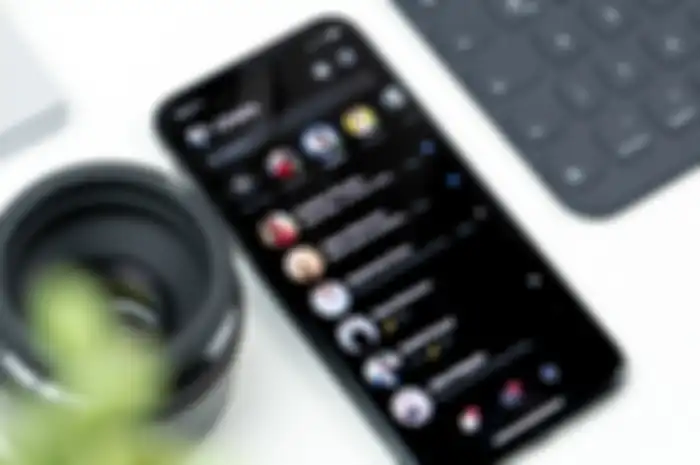 Aplikasi WhatsApp iOS yang akan kehadiran fitur transkrip chat otomatis.
