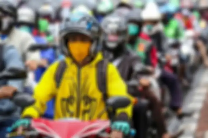 Ilustrasi pengendara motor. Catat, Ini yang Harus Dilakukan Biar Tetap Fit Saat Riding Sambil Berpuasa
