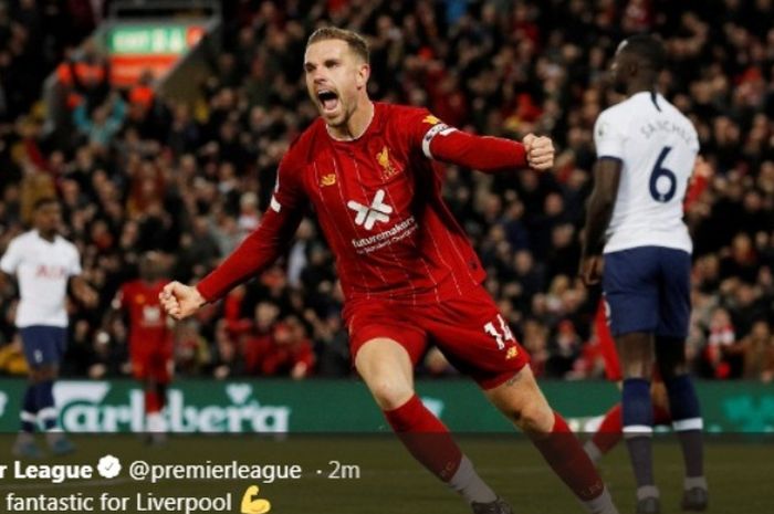 Kapten Liverpool, Jordan Henderson, merayakan gol ke gawang Tottenham Hotspur dalam laga di Anfield, Minggu (27/10/2019).