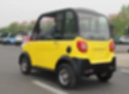 Mobil listrik Z11 tampak belakang.