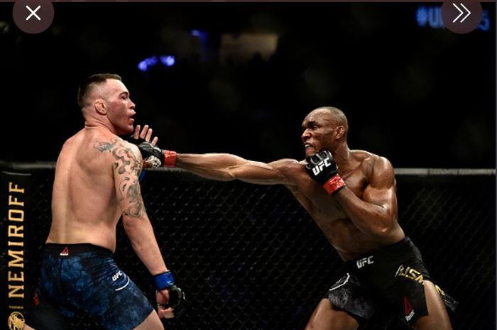 Colby Covington (kiri) dan Kamaru Usman (kanan) saat bertarung pertama kali pada UFC 245, Desember 2019 lalu.