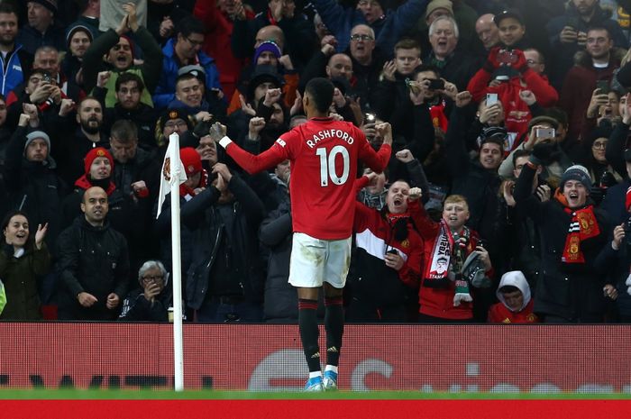 Penyerang Manchester United, Marcus Rashford, merayakan gol yang dicetak ke gawang Tottenham Hotspur dalam laga Liga Inggris di Stadion Old Trafford, Rabu (4/12/2019).