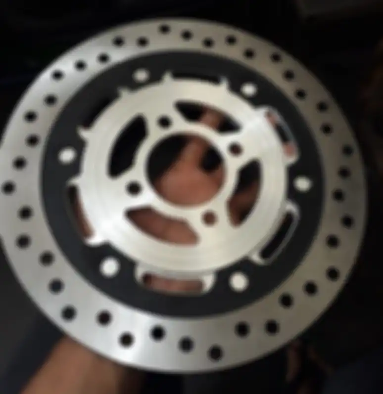 Piringan atau cakram depan Honda Tiger dan adaptor dari STMJ