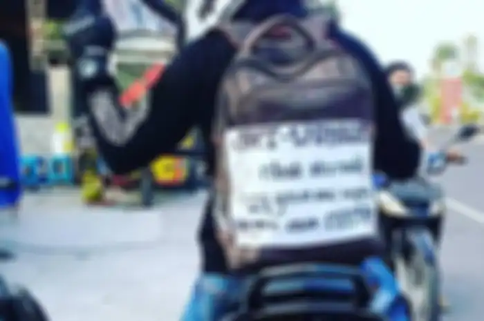 Pemudik dengan tulisan 