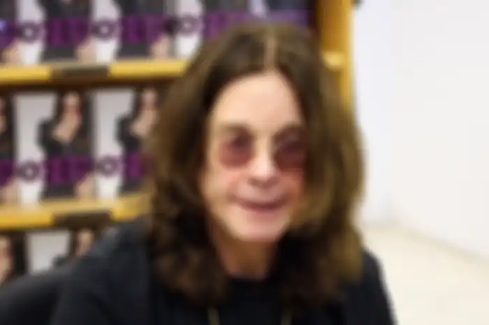 Ozzy Osbourne signing his autobiography I AM OZZY at Changing Hands Books in Tempe, AZ Feb 20, 2010.