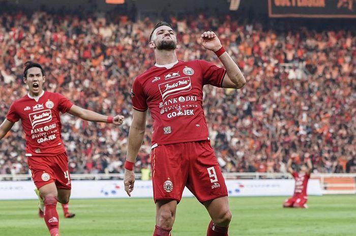 Striker Persija Jakarta, Marko Simic, melakukan selebrasi setelah mencetak gol ke gawang Persib Bandung pada pekan kedelapan Liga 1 2019.