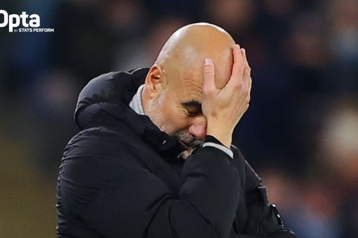 Rawut kekecewaan dari pelatih Manchester City, Pep Guardiola.