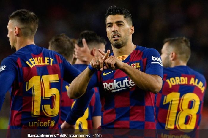 Selebrasi Luis Suarez usai mencetak gol keduanya pada pertandingan Barcelona kontra Valencia dalam lanjutan Liga Spanyol, Sabtu (14/9/2019).