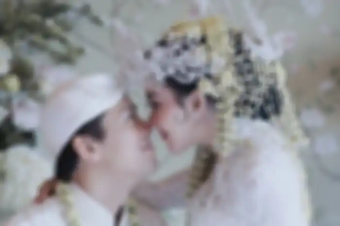 Syahrini dan Reino Barack