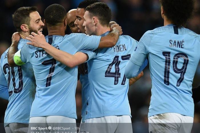 Para pemain Manchester City saat merayakan gol ke gawang Schalke dalam partai Liga Champions.