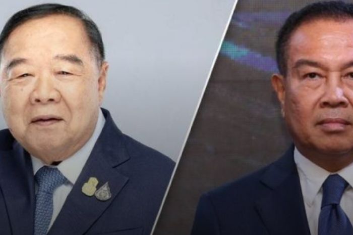 Deputi Perdana Menteri Thailand Prawit Wongsuwan (kiri) diduga kuat intervensi terhadap FAT yang memaksa presidennya, Somyot Poompanmoung (kanan), mundur. Thailand kini terancam sanksi FIFA.