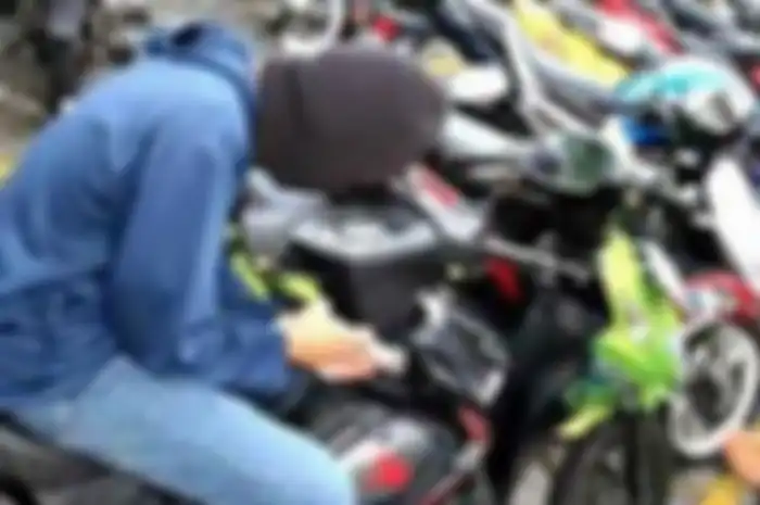 Ilustrasi maling motor.