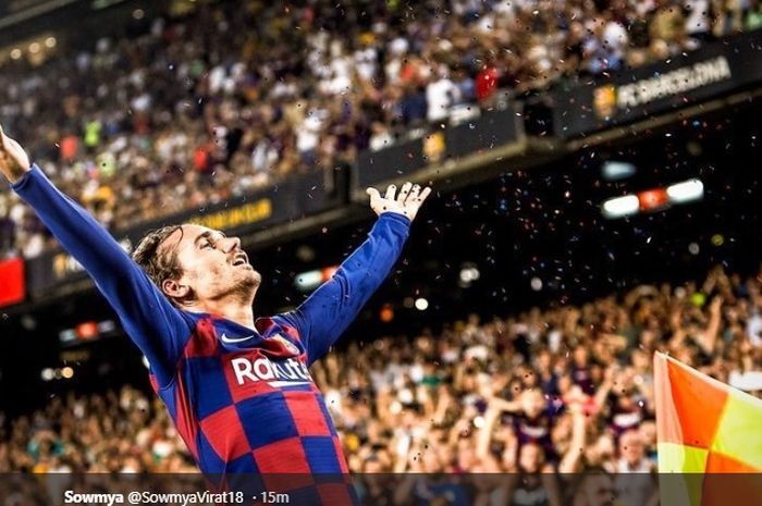 Antoine Griezmann melakukan selebrasi setelah sukses menyarangkan gol keduanya pada pertandingan Barcelona melawan Real Betis di Stadion Camp Nou pada pekan kedua Liga Spanyol 2019-2020, Minggu (25/8/2019).