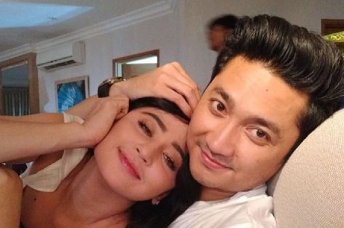 Dewi Perssik dan suaminya, Angga Wijaya.