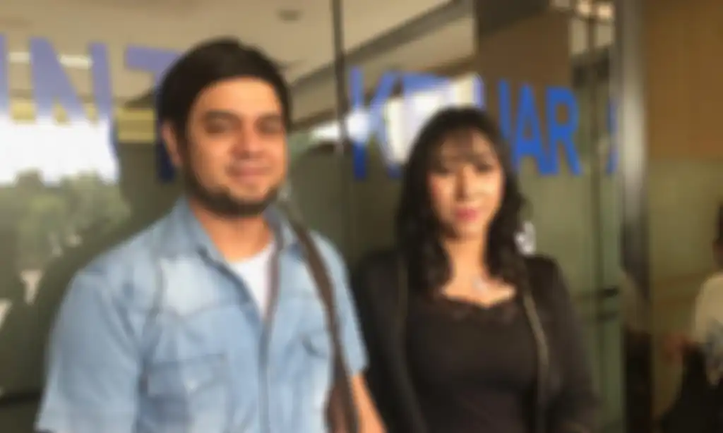 Rio Reifan dan istrinya, Henny Yuliyanah saat datangi SPKT (Sentra Pelayanan Kepolisian Terpadu), Polda Metro Jaya, Jakarta Selatan pada Kamis (30/5/2019).