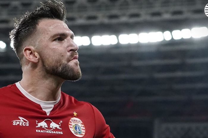 Penyerang Persija Jakarta, Marko Simic, melakukan selebrasi usai mencetak tiga gol ke gawang Madura United di Stadion Umum Gelora Bung Karno, Jumat (13/12/2019).