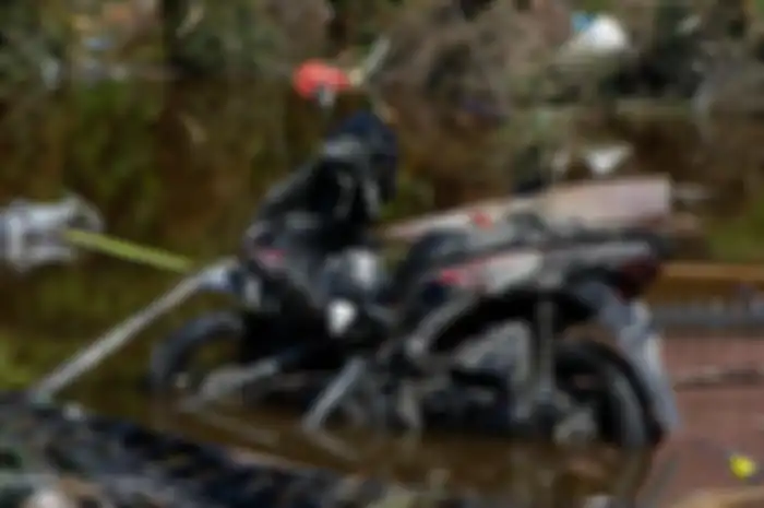 Ilustrasi motor rusak pasca tsunami.
