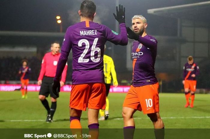 Sergio Aguero (kanan) saat mencetak gol Manchester City ke gawang Burton Albion, 23 Januari 2019.