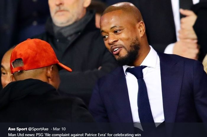 Patrice Evra saat menonton laga tandang Manchester United melawan Paris Saint-Germain di Parc des Princes.