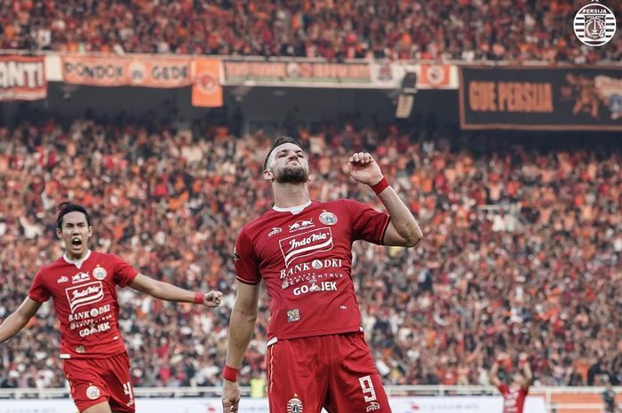 Striker Persija Jakarta, Marko Simic, melakukan selebrasi setelah mencetak gol ke gawang Persib Bandung pada pekan kedelapan Liga 1 2019.