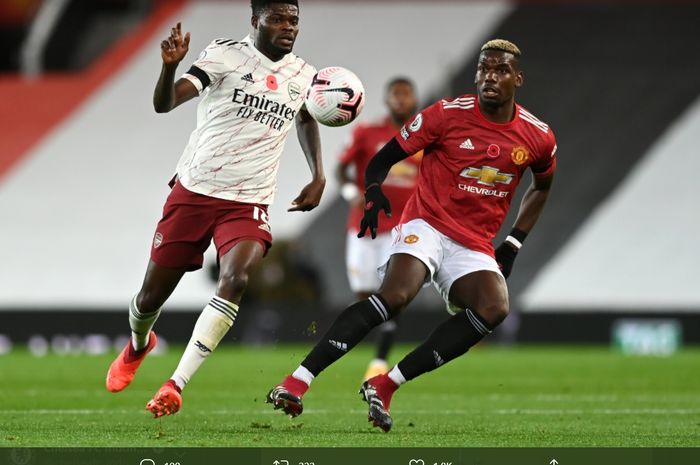 Duel  antara Thomas Partey dan Paul Pogba menghiasid pertandingan antara Manchester United dan Arsenal di Old Trafford, Minggu (1/11/2020).