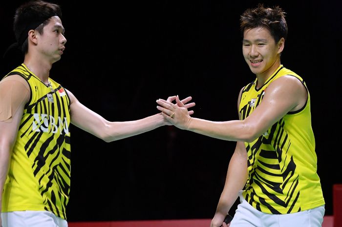 Pasangan ganda putra Indonesia, Marcus Fernaldi Gideon/Kevin Sanjaya Sukamuljo, pada laga terakhir grup BWF World Tour Finals 2021 di Bali International Convention Centre, Nusa Dua, Jumat (3/12/2021)