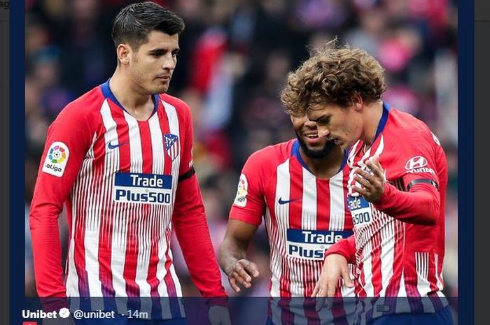 Alvaro Morata (kiri) menyediakan assist buat Antoine Griezmann (kanan) dalam partai Atletico Madrid di markas Rayo Vallecano, 16 Februari 2019.