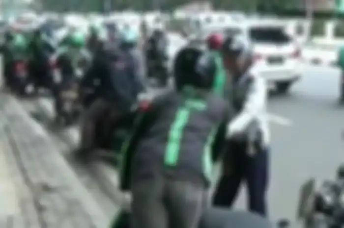 Ilustrasi driver ojek online mangkal sembarangan ditangkap Dishub.