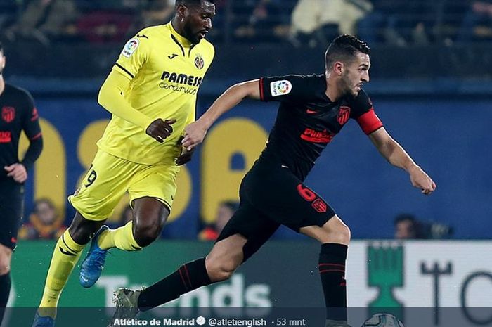 Kapten Atletico Madrid, Koke menggiring bola ketika dibayang-bayangi Zambo Anguissa pada  laga lanjutan La Liga Spanyol pekan ke-16, Sabtu (7/12/2019) di Stadion De La Ceramica.