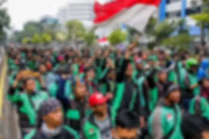 Aksi demo yang dilakukan para driver ojek online menuntut kenaikan tarif