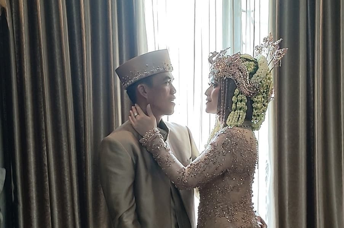 Meggy Wulandari dan suami barunya