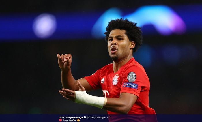 Pemain Bayern Muenchen, Serge Gnabry, melakuan selebrais seusai menjebol gawang Tottenham Hotspur pada Selasa (1/10/2019).